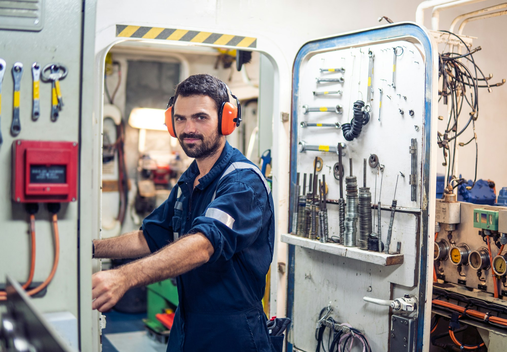 Marine engineer officer working in engine room